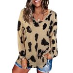 Blusa con mangas estampado animal print y bloques de color