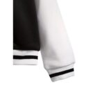 Chaqueta varsity niña negra y blanca con parche "S" - Imagen 3