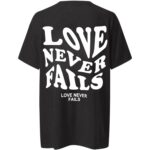Polera negra OverSize Niña "Love Never Fails" (espalda) - Imagen 2